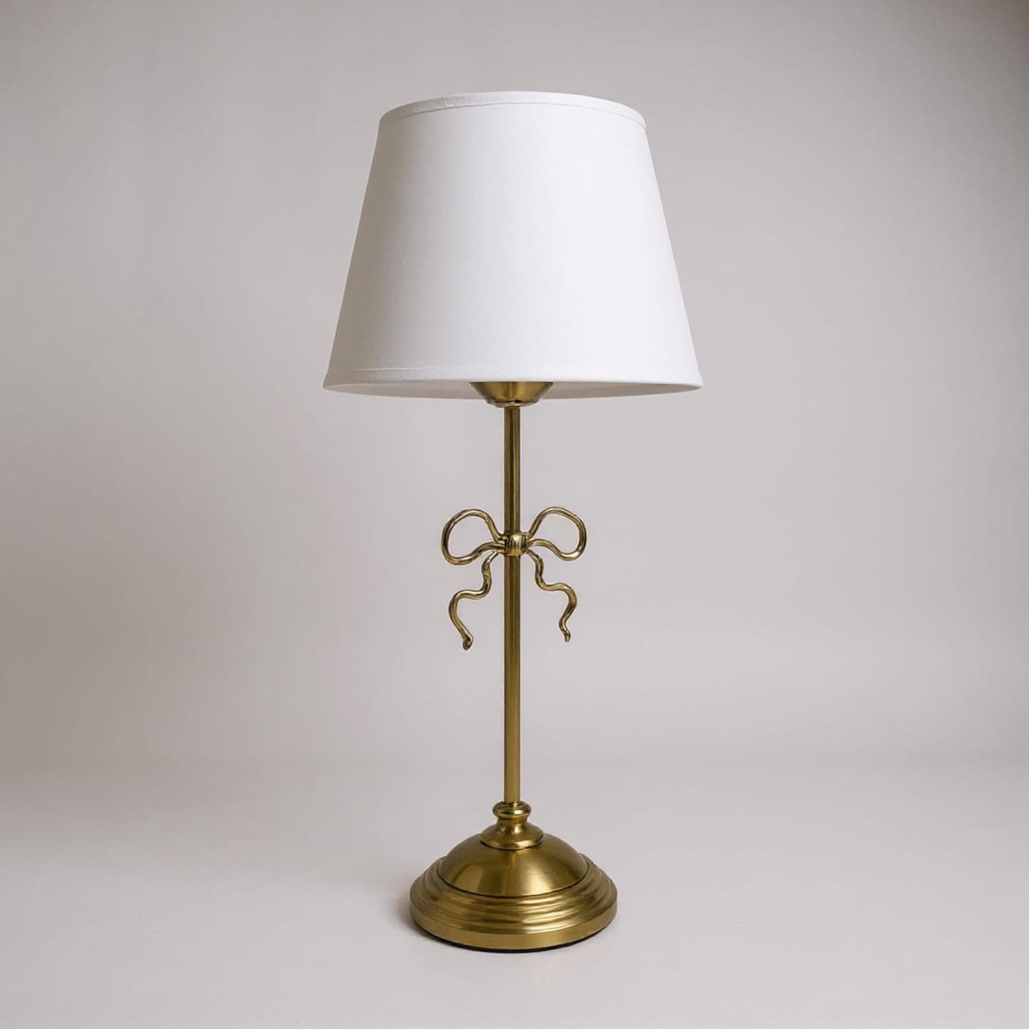 gold bow desk lamp — photo 1 of 3